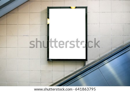 Blank billboard or poster in the city building, shot in subway station