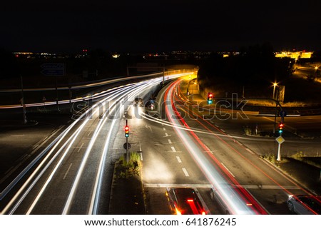 A time exposure picture of cars.