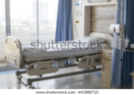 blurred hospital room for background.