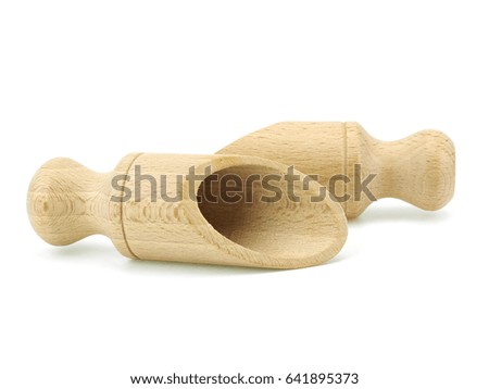 Empty wooden scoop on a white background