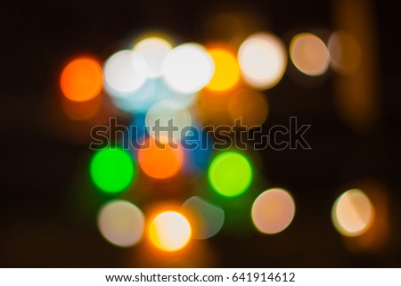 Blur - bokeh Decorative outdoor string lights hanging in the garden at night time