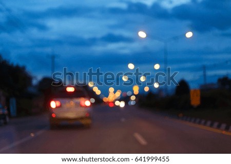 night light of traffic car on the city street, abstract blur bokeh background