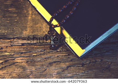 cross and book