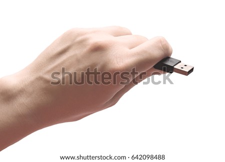 Hand holding usb device isolated photo