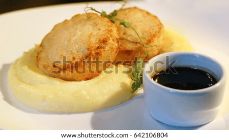 Two delicious Turkey cutlets with mashed potatoes to take a picture closeup