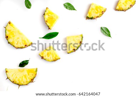 sliced pineapple in exotic summer fruit design white background top view mock-up Royalty-Free Stock Photo #642164047
