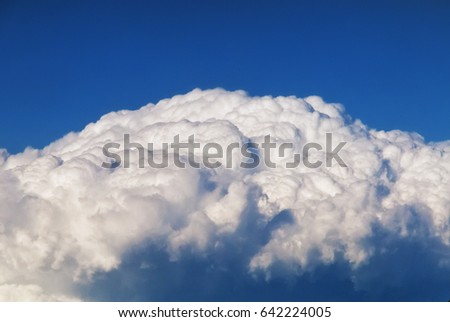 Top of Cumulonimbus Cloud Against Blue Sky