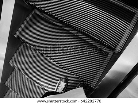 Up escalator black and white