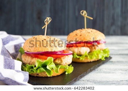 Homemade healthy Turkey Burger with Lettuce and Tomato. selective focus.