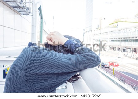 Depressed woman in the city