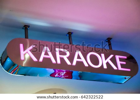 Karaoke sign in department store.