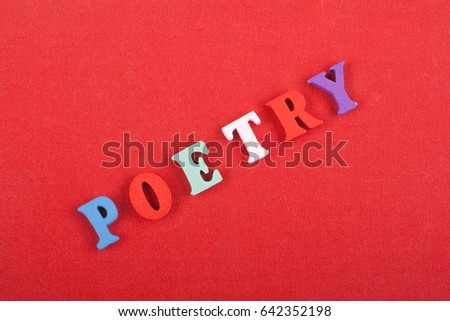 POETRY word on red background composed from colorful abc alphabet block wooden letters, copy space for ad text. Learning english concept