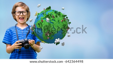 Digital composite of Happy boy holding camera by low poly earth