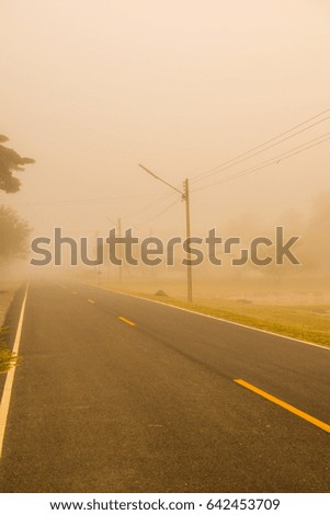 Running track with mist in winter season at Phayao province, Thailand.