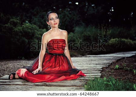 Woman in red suit