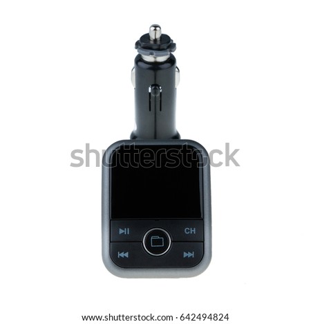 Mp3 Fm transmitter with remote control isolated on white background. It plays mp3, you listen on fm channel on car radio.