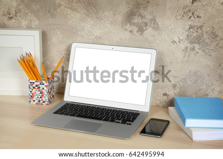 Comfortable workplace with modern laptop