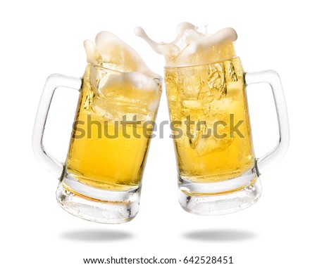 Cheers cold beer with splashing out of glasses on white background. Royalty-Free Stock Photo #642528451
