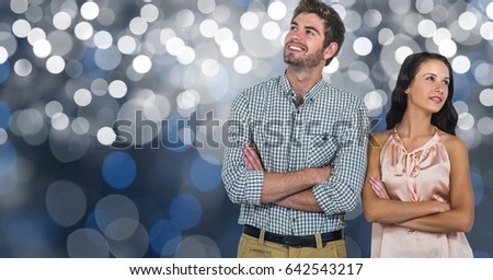 Digital composite of Thoughtful young couple with arms crossed looking away over bokeh