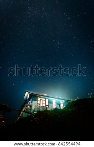 A night view with an enlighten hut