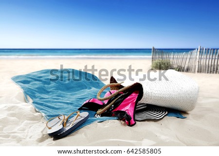 Empty summer towel on beach for your decoration and landscape of sea 