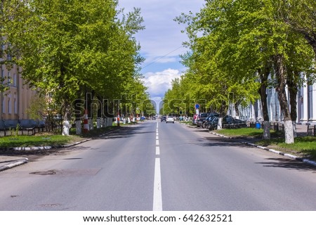 The carriageway of a small provincial town Dzerzhinsk, Russia. Sunny summer cityscape.