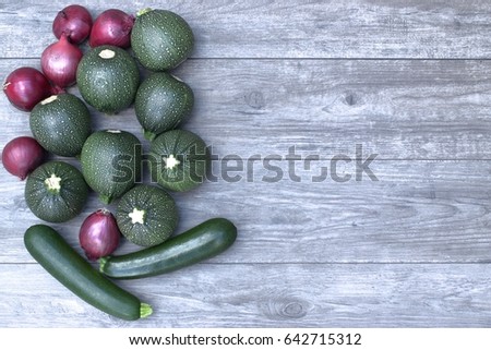 Fresh vegetables on a wooden table with copy space.