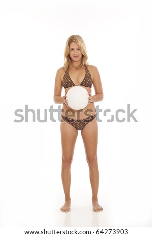 Woman holding volleyball