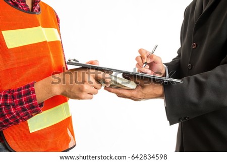 Construction worker giving a bribe to endorser for approve the work project. Concept - corruption. Royalty-Free Stock Photo #642834598
