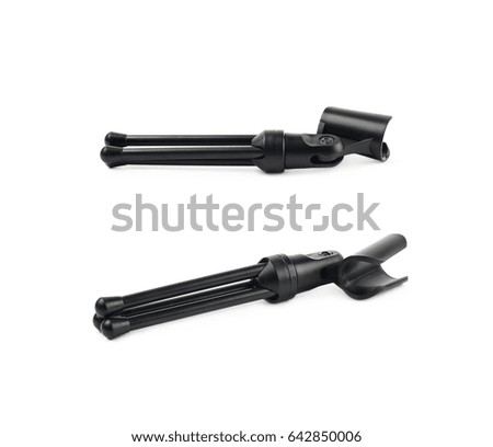 Black microphone short rack stand lying on its side isolated over the white background, set of two different foreshortenings
