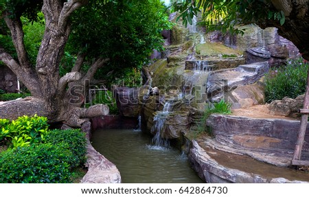 Artificial Waterfall Royalty-Free Stock Photo #642864730