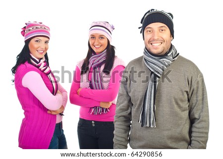 Three happy friends models posing in knitted colorful clothes isolated on white background