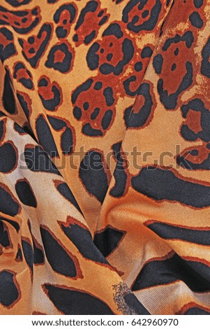 
Leopard animal print pattern fabric cloth sample. 
wild animal pattern background or texture.