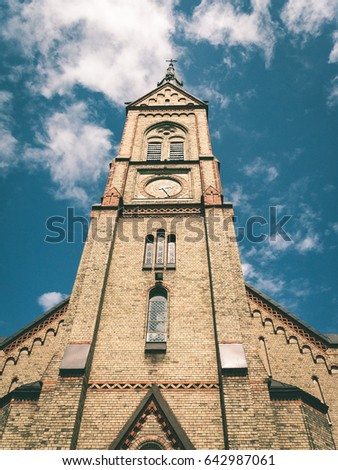 old church building details. gothic architecture and rock fundament - vintage green look