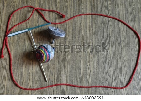 Low key picture of Wooden antique toys on wood background.