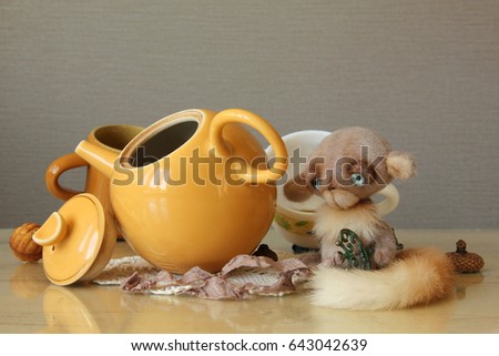 Photo composition based on the fairy tale "Alice in Wonderland". Mad tea-drinking with the participation of a sleeping mouse, handmade toy.