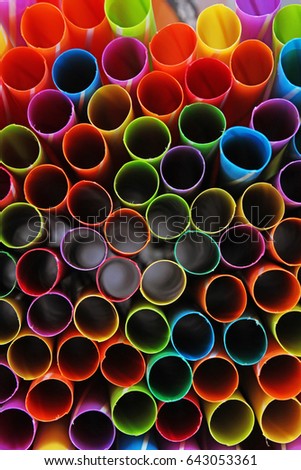 Art background .Fancy straw art design background. Abstract wallpaper of colored fancy straws. Rainbow colored colorful pattern texture.
