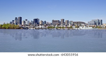 Skyline of Montreal city with reflection on the water