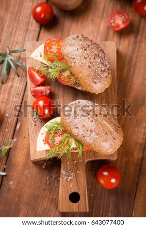 healthy  breakfast-sandwich with tomato and cheese  in studio