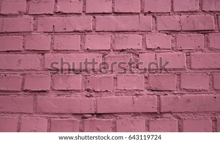 Pink brick wall texture grunge background with vignetted corners, may use to interior design