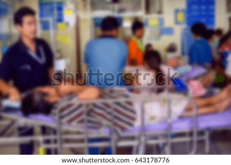 Blurry images of patients lying in wait in hospital.