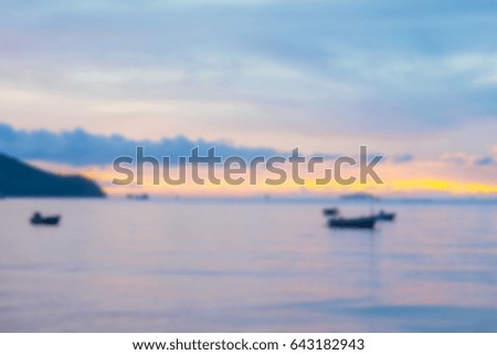 Subject is blurry , Fishing boat in the sea during sunset