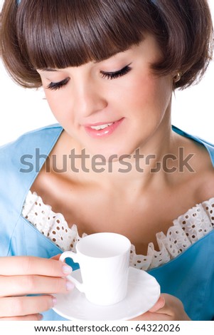 portrait of young woman enjoying a cup of coffee on white background