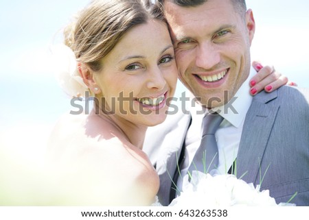 Beautiful bride and groom on their wedding day                     