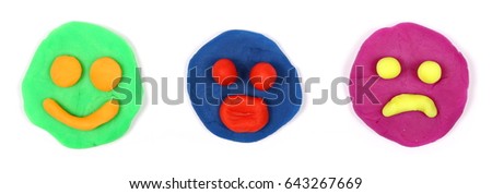 Set of colorful plasticine faces isolated on white background