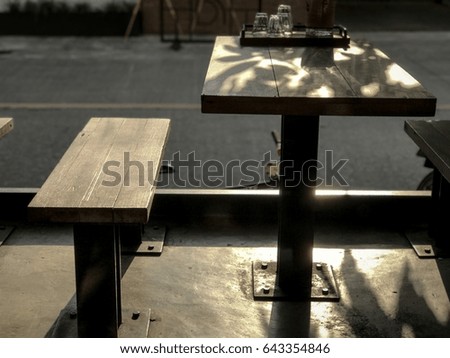 Side view of back light of a table outdoor cafe , Illuminate light and blurred background