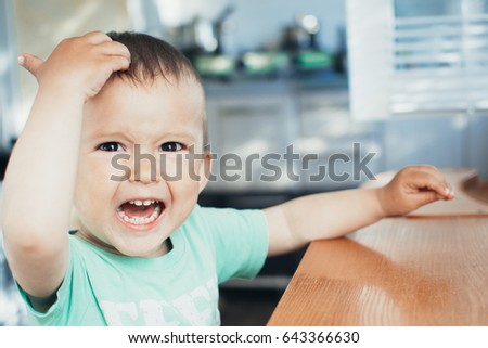 child left hand took hold of the head he stunned