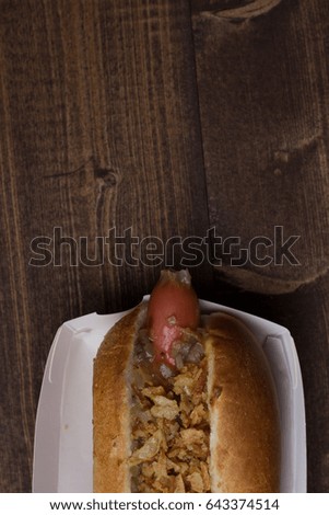Hot dog on a wooden background, fast food, Hotdog eat