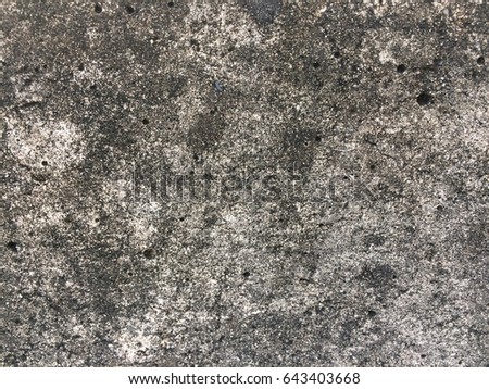 Dirty dark cement wall background texture
