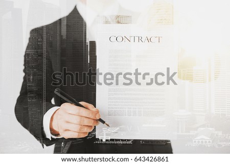 people and business concept - close up of businessman holding contract paper over city with double exposure